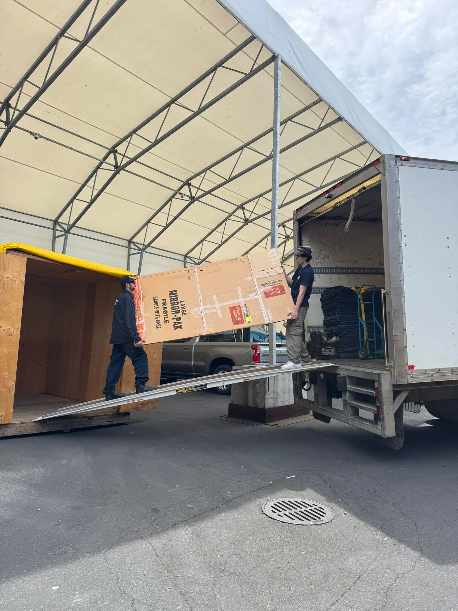 Loading a mobile storage locker in the UPAK warehouse