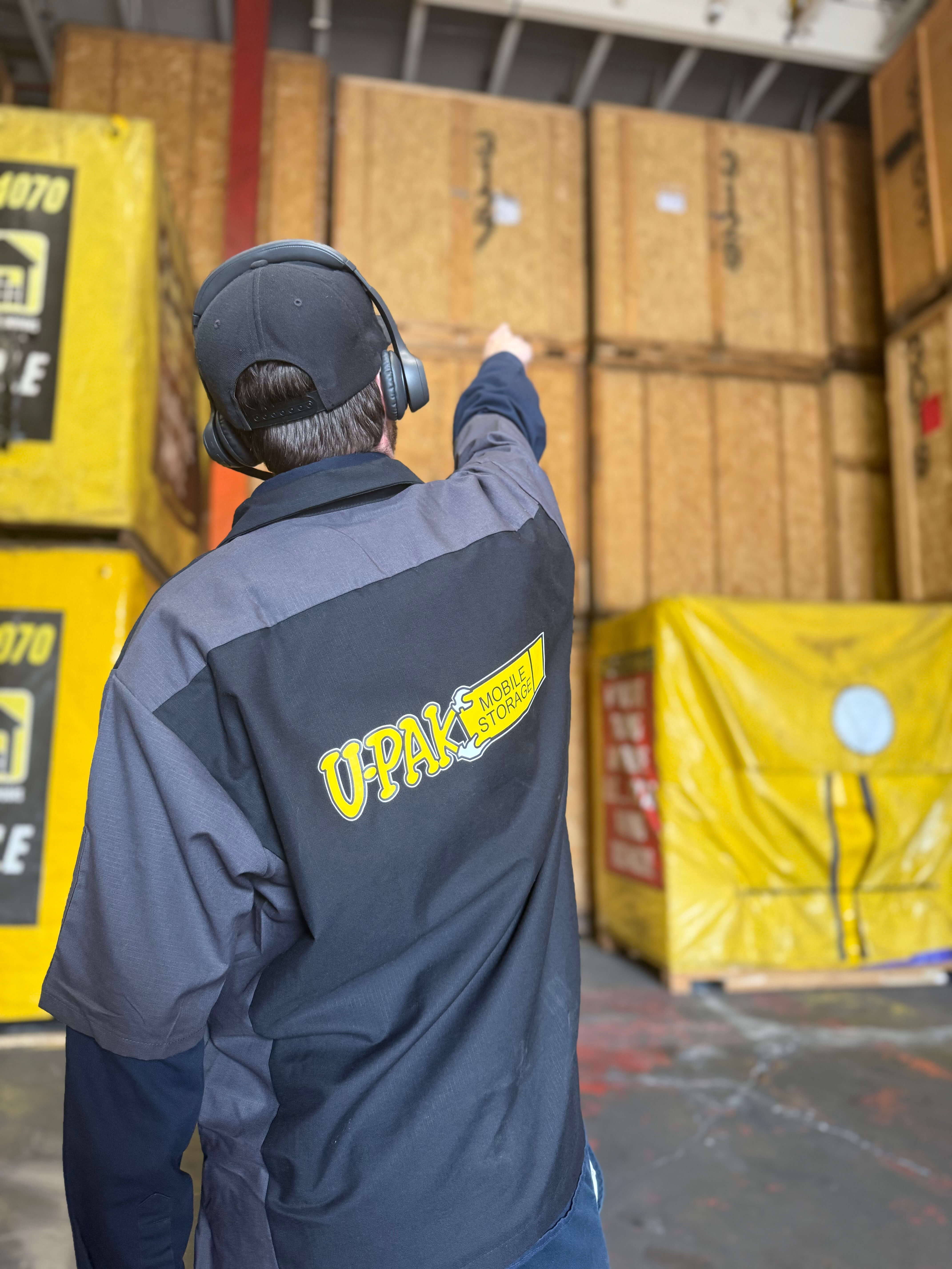UPAK team member with mobile storage lockers
